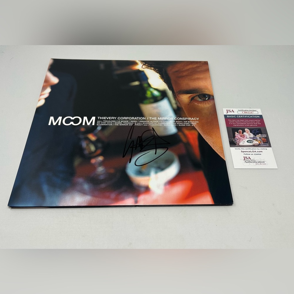 Rob Garza of Thievery Corporation signed The Mirror Conspiracy Album JSA COA